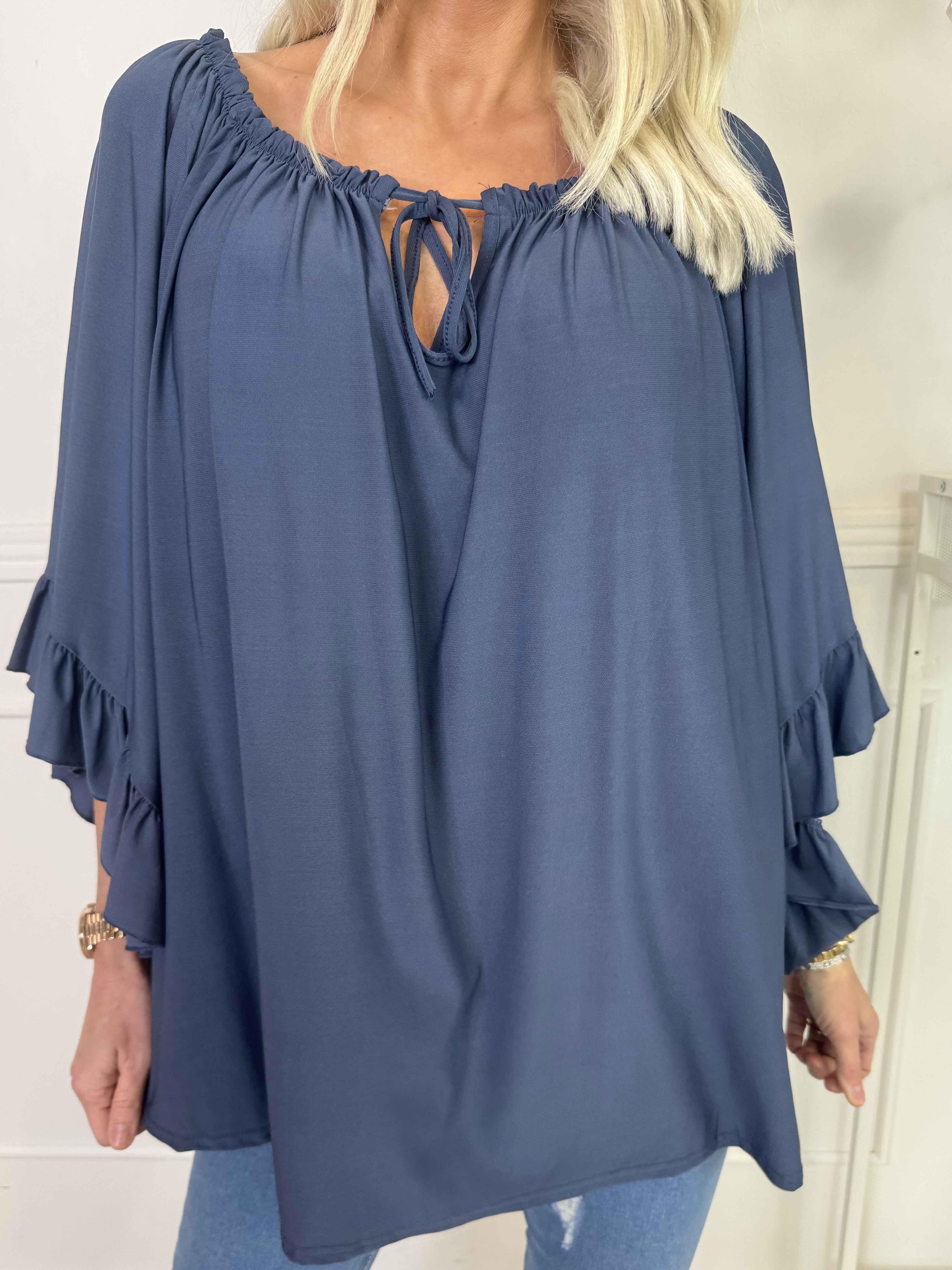 Anneli - Söt elastisk tunika med volangärmar